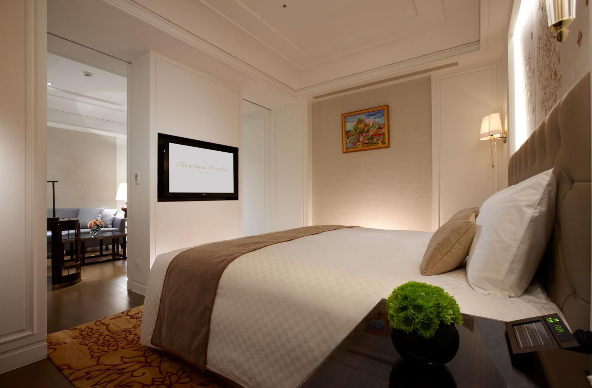 Hotel The Okura Prestige Taipéi Exterior foto A bedroom at the hotel
